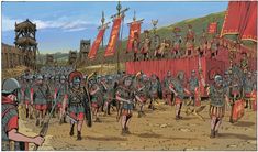 a group of men standing next to each other on top of a dirt field with red flags