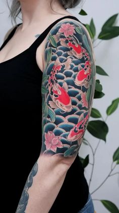 a woman with a tattoo on her arm