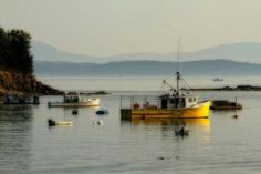 there is a yellow boat in the water