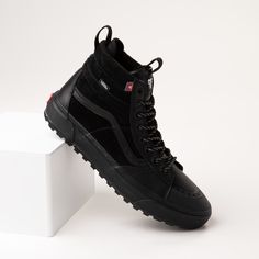 Vans Sk8 Hi MTE-2 Skate Shoe - Black Monochrome | Journeys Vans Tactical Boots, Black Sporty Vans Hiking Boots, Black Vans Boots For Outdoor, Vans Waterproof Black Boots, Vans Black Outdoor Boots, Vans Black Hiking Boots For Streetwear, Vans Black Waterproof Boots, Black High-top Sneakers For Skateboarding With Rubber Waffle Outsoles, Black High-top Vans Boots