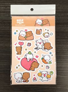 the sticker sheet has various animals and hearts on it, including one bear with a heart