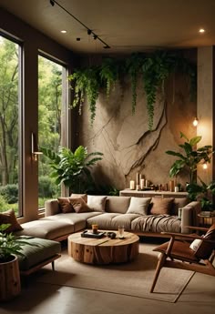 a living room filled with lots of furniture next to a large window covered in greenery
