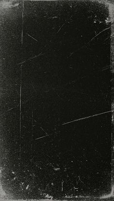 an old black and white photo with lines in the middle, on a dark background