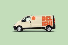 a delivery truck with the word del ish on it's side and orange lettering
