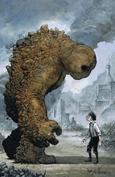 a boy standing next to a giant monster
