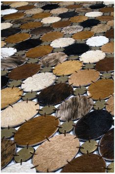 the rug is made up of different colors and shapes
