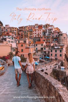 two people walking down a stone walkway with the words, the ultimate northern italy road trip