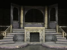 the stage is set up for a performance with steps and railings leading to an open fire place