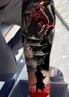 a man with a tattoo on his arm