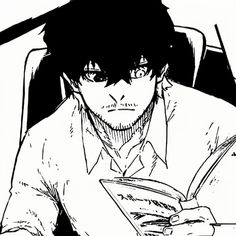 an image of a man reading a book