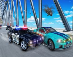 two police cars driving down a highway next to each other in front of a helicopter