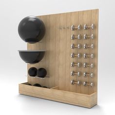 an abacusk with three balls and two plates on it, in front of a white background