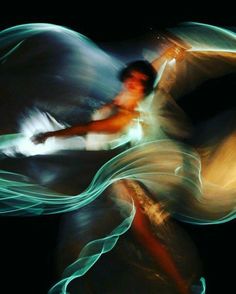 a blurry photo of a man dancing