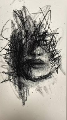 a drawing of a woman's face with black lines on it