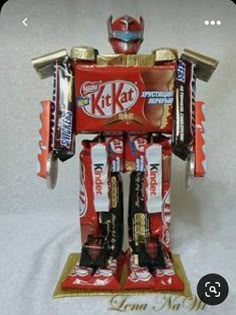 a toy robot made out of candy bars