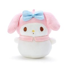 a small stuffed animal with a bow on its head