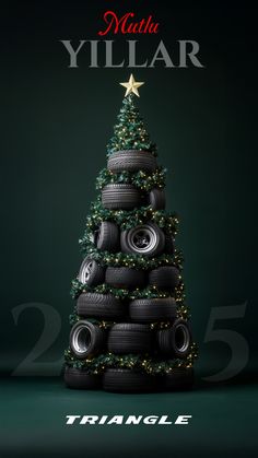 a christmas tree made out of tires with the words, trail e written on it