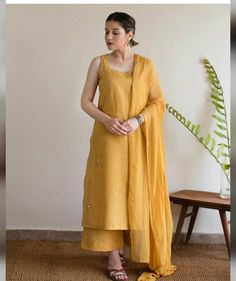 Sleeveless Suit Designs Cotton, Sleeveless Suit Designs Indian Style, Plain Sleeveless Kurti Designs, Elegant Sleeveless Kurta For Eid, Sleeveless Kurti Styling, Yellow Kurti For Women, Simple Sleeveless Kurti Designs, Yellow Kurti With Pants, Sleeveless Kurti Outfit