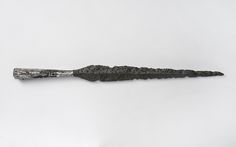 a knife that is laying on the ground