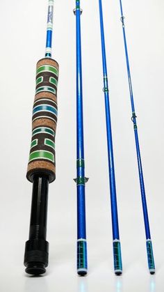 three different types of fishing rods on a white background, one is blue and the other is green