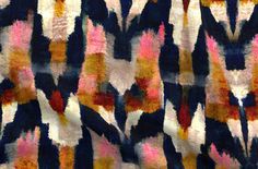an abstract, multicolored fabric with black and white stripes