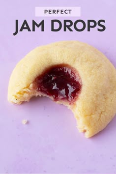 a cookie with jam in it and the words perfect jam drops