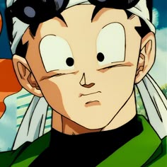 a close up of a person with black hair and glasses on his head, looking at the camera