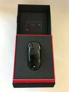 a red and black box with a computer mouse in it's side - by - side