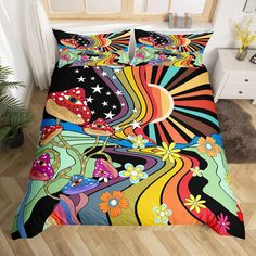 a bed with colorful designs on it in a room next to a potted plant