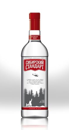 a bottle of vodka with a dog on the label and an airplane in the background