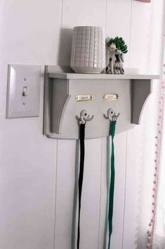 there is a coat rack on the wall