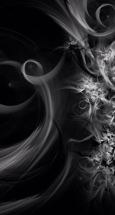 an abstract black and white photo with swirls in the middle, on a dark background
