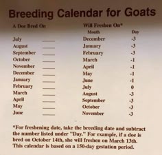 a sign with dates on it that says breeding calendar for goats