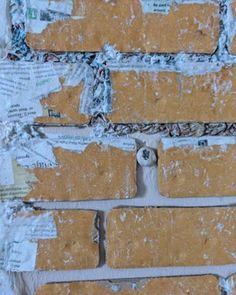 some pieces of paper are taped to the wall