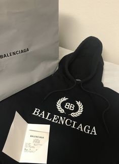 Expensive Hoodies Brands, Balenciaga Logo Aesthetic, How To Style Balenciaga Hoodie, Balenciaga Hoodie Outfit, Luxury Black Teddy Bear, Balenciaga Hoodie Outfit Women, Black Aesthetic Louis Vuitton, Balenciaga Black And White Aesthetic, Balenciaga Bb Hoodie Black