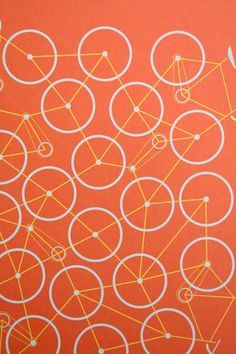 an orange background with white circles and lines