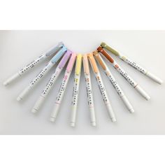 six different colored markers are arranged in a circle