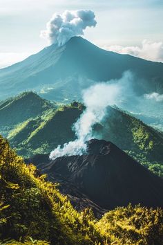 "Explore the world’s most dramatic volcano landscapes for a truly unforgettable experience! 🌋🔥 Perfect for adventurous travelers. #VolcanoLandscapes #DramaticNature #VolcanoTravel" Beautiful Volcano Landscape, Volcano Landscape, Volcano With Green Landscape, Volcanic Landscape, Volcanic Landscape Travel, Majestic Volcano Landscape, Volcano With Lush Green Forest, Volcano In Lush Green Landscape, Volcanic Landscapes From Above