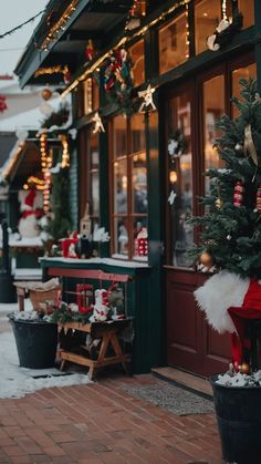 a small christmas tree in front of a store
