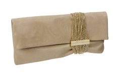 The Jimmy Choo Chandra in Shimmer Suede: An evening clutch that adds a dash of Hollywood glamour to any ensemble, the Chandra is a casual evening bag enfolded in pale gold bands with a magnetic clasp. The perfect accessory to a special evening, ladies, it will add that subtle sparkle to lift everything from an LBD to a colourful lehenga. Available at Jimmy Choo stores around the country. Jimmy Choo Chandra, Clutch Outfit, Jimmy Choo Clutch, Casual Evening, Pale Gold, Style Change, Evening Clutch, Hollywood Glamour, Gold Bands