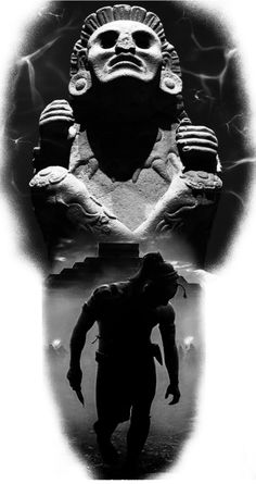 a black and white photo of a man standing in front of a statue with his head turned to the side