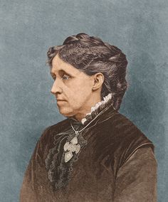 an old photo of a woman in black dress