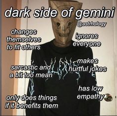a person wearing a paper bag over their head with words written on it that read, dark side of germini