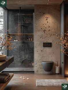 a bathroom with a shower, toilet and sink in it's center wall is shown