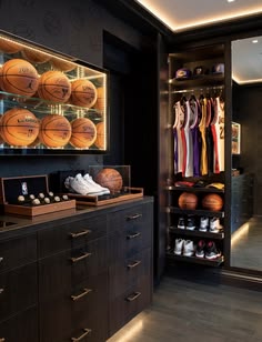 a closet with basketballs, shoes and other items in it's display area