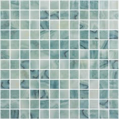 a blue and white tiled wall with small squares