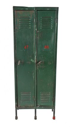 two green metal lockers with red numbers on the front and bottom doors, standing upright against a white background