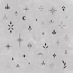 an assortment of black and white tattoos on a gray background