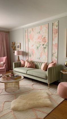 a living room filled with furniture and pink accents on the walls, along with rugs
