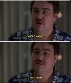 the big bangzle is making funny faces with his mouth wide open and tongue out